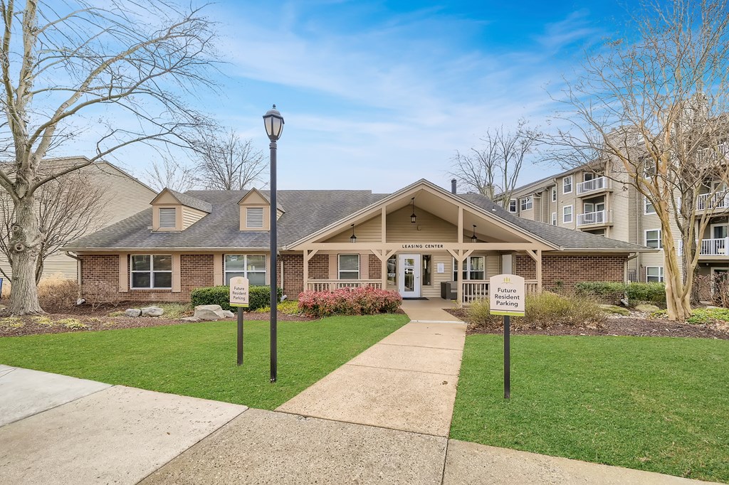 Exterior of the leasing office and clubhouse at Hunt Club apartments for rent