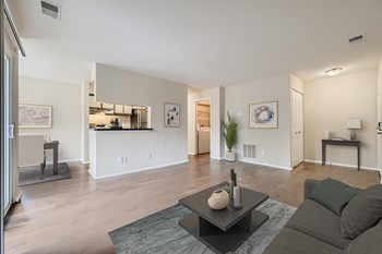 Living area, kitchen, and dining room at Hunt Club apartments for rent - Photo Gallery 8