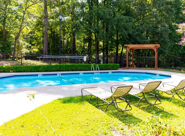 Swimming pool and deck at Forest Ridge Apartments