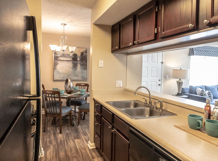 Forest Pointe kitchen interior with through wall to living room