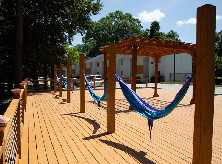 poolside sundeck with hammocks at apartment complex in Macon GA