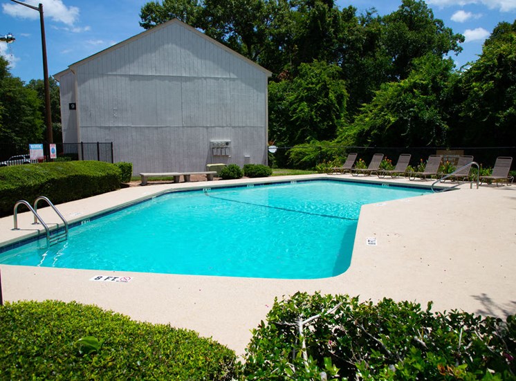 Macon GA apartments with pool and poolside lounge chairs