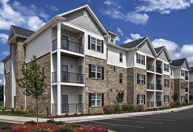 Exterior of residential buildings at Retreat at the Park apartments for rent in Burlington NC