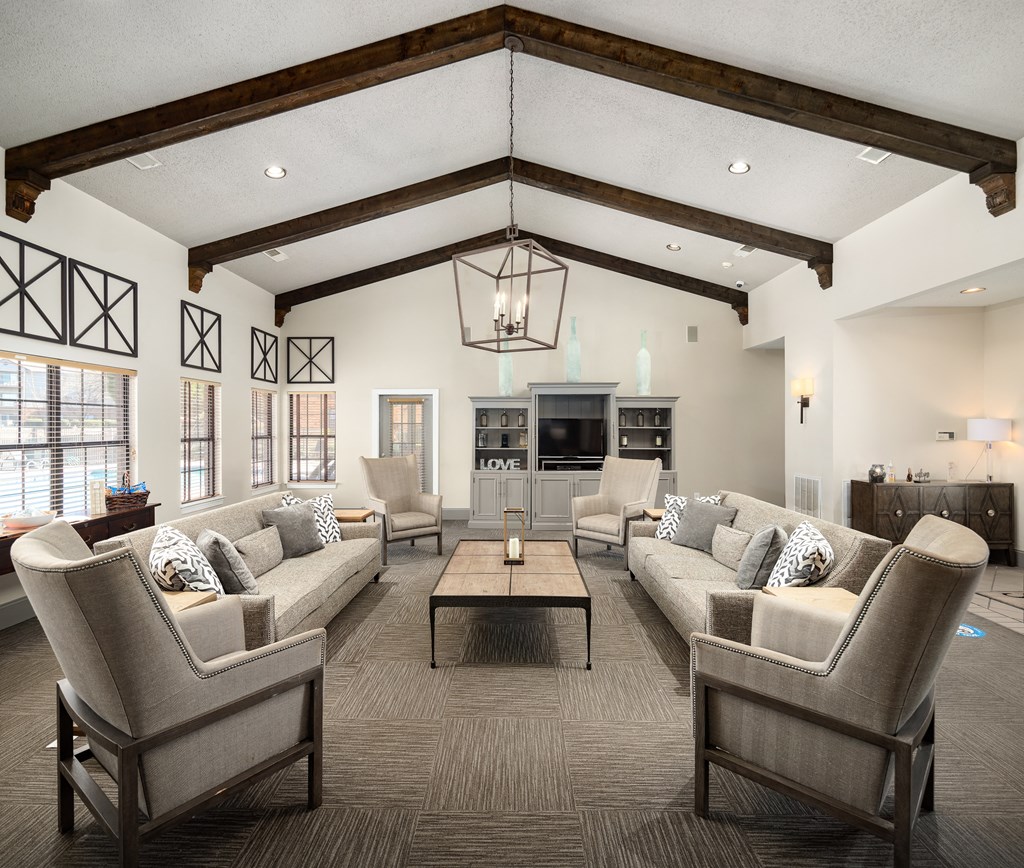 Leasing office interior with seating areas at The Oaks of St. Clair in Moody, AL