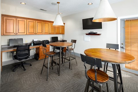 Business center with computers, printers and TV at The Oaks of St. Clair in Moody, AL