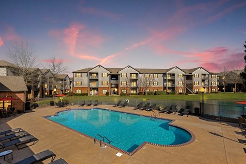 Looking across the swimming pool towards residential buildings at The Oaks of St. Clair