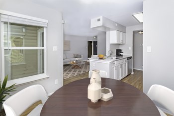 Renovated unit dining area and open kitchen at  Springwoods at Lake Ridge - Photo Gallery 14