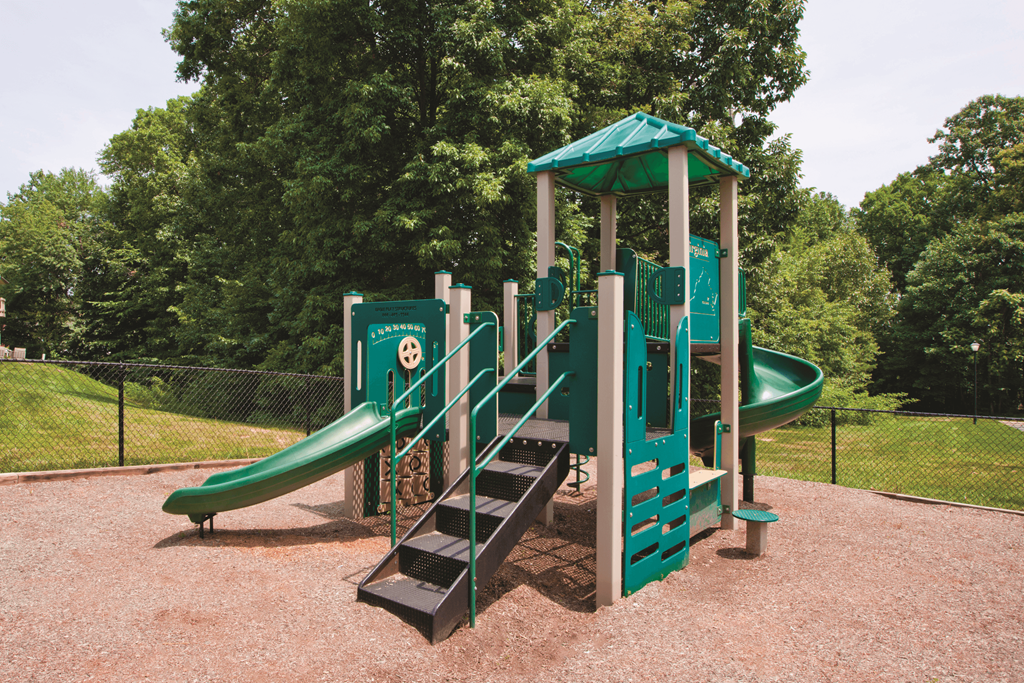 Children's playground with slides at Springwoods at Lake Ridge