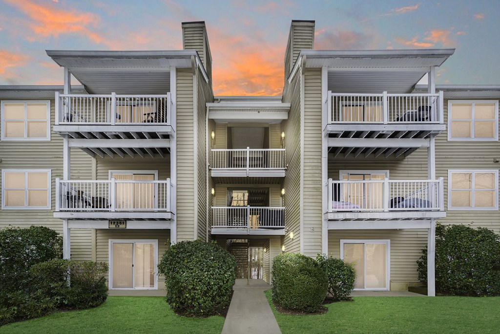 Residential building with private patios and balconies at Springwoods at Lake Ridge in Woodbridge, VA