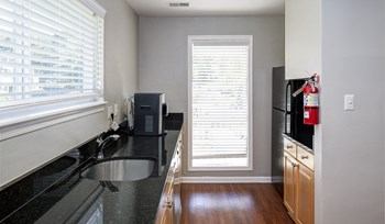 Apartment clubhouse coffee station at Springwoods at Lake Ridge in Woodbridge. - Photo Gallery 7