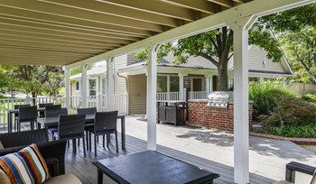 Apartment grilling station and patio at Springwoods at Lake Ridge. - Photo Gallery 8