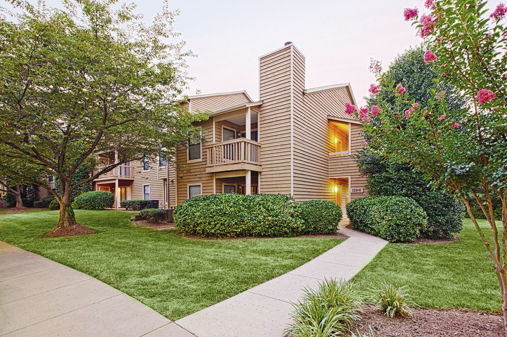 Residential building with private patios and balconies at Adrian on Stonecreek Club