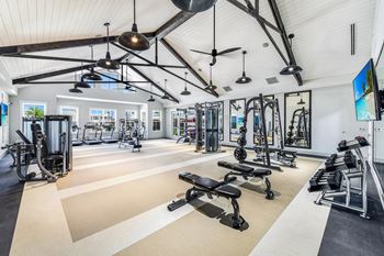 Premium fitness center with cardio and strength equipment at The Highland