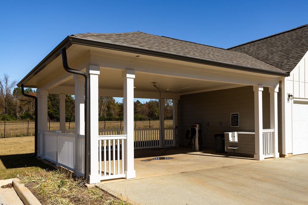 Car care center and pet spa with deck and concrete flooring at The Alexandria in Madison, AL
