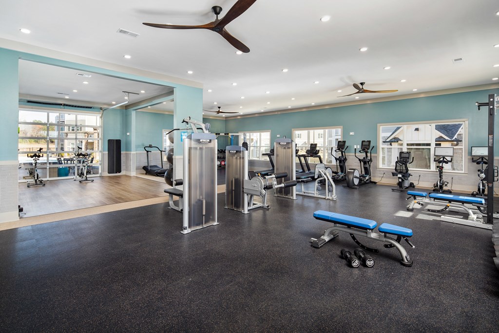 The Alexandria premium fitness center with exercise machines andd soft flooring in Madison, AL