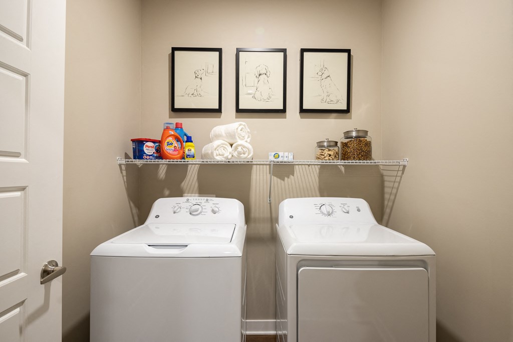 In-unit laundry room with full-size washer and dryer at The Alexandria in Madison, AL