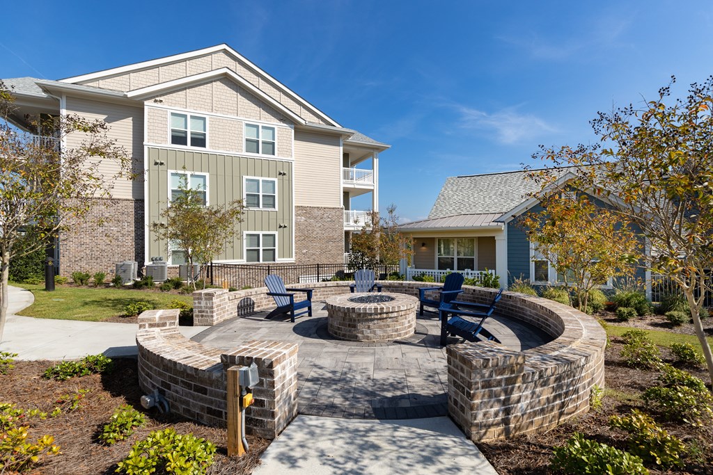 Cozy fire pit with seating at The Highland in Augusta, GA