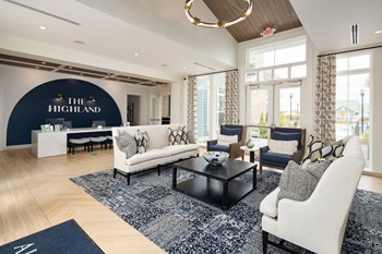 The Highland leasing office interior along with sofas and seating - Photo Gallery 7