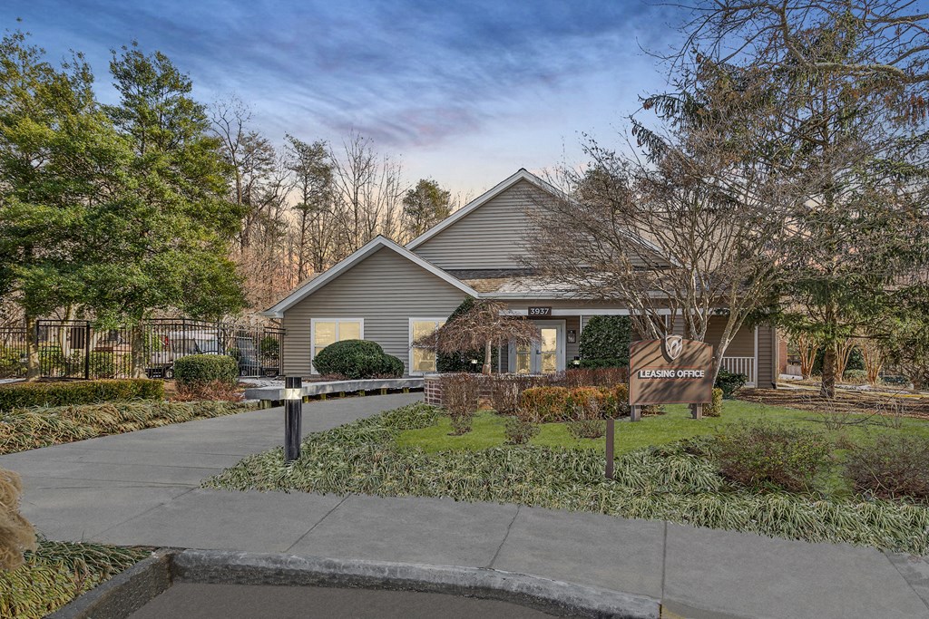 Leasing office exterior with lush landscaping at Windsor Park in Woodbridge, VA