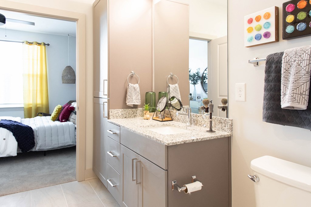 Foundry Yards apartment bathroom with view of bedroom at Foundry Yards