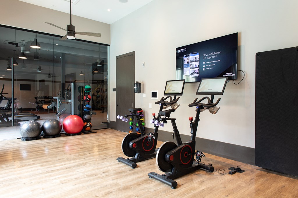 Birmingham apartment fitness center with spin room and yoga