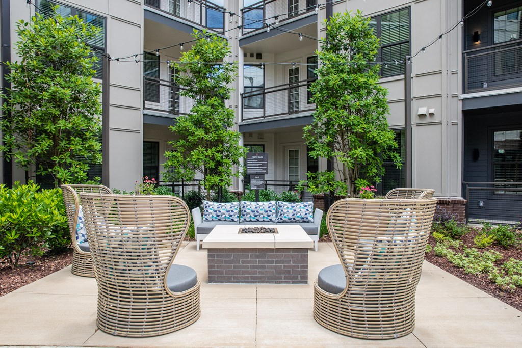 Birmingham, AL Apartment building fire pit and cozy seating at Foundry Yards