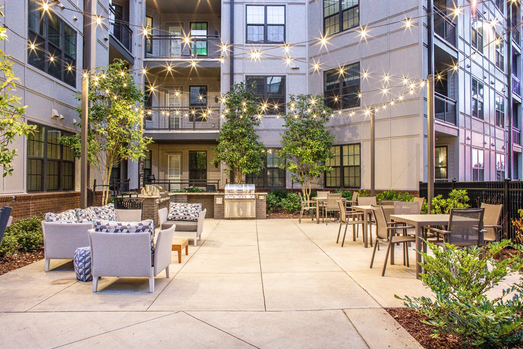 Foundry Yards apartment building outdoor community space with kitchen and grilling station