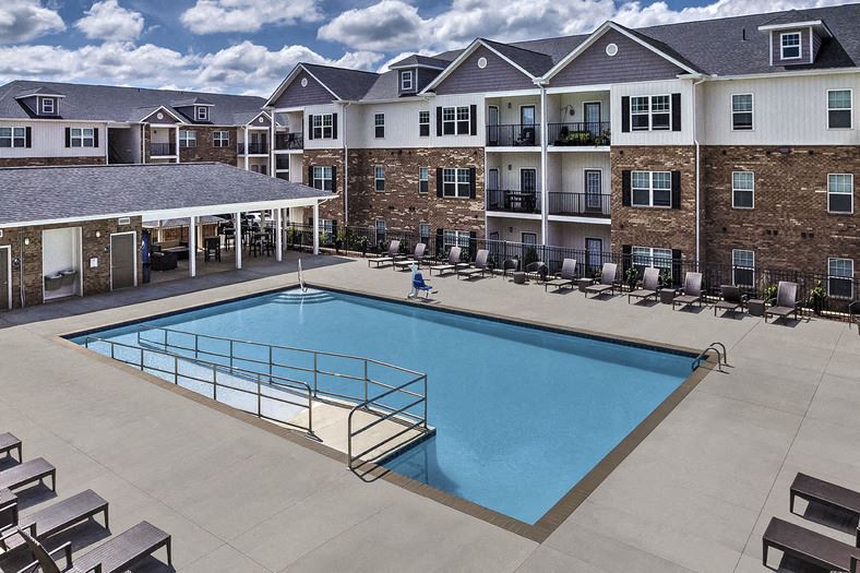 Resort-inspired saltwater swimming pool at Retreat at the Park apartments for rent - Photo Gallery 1