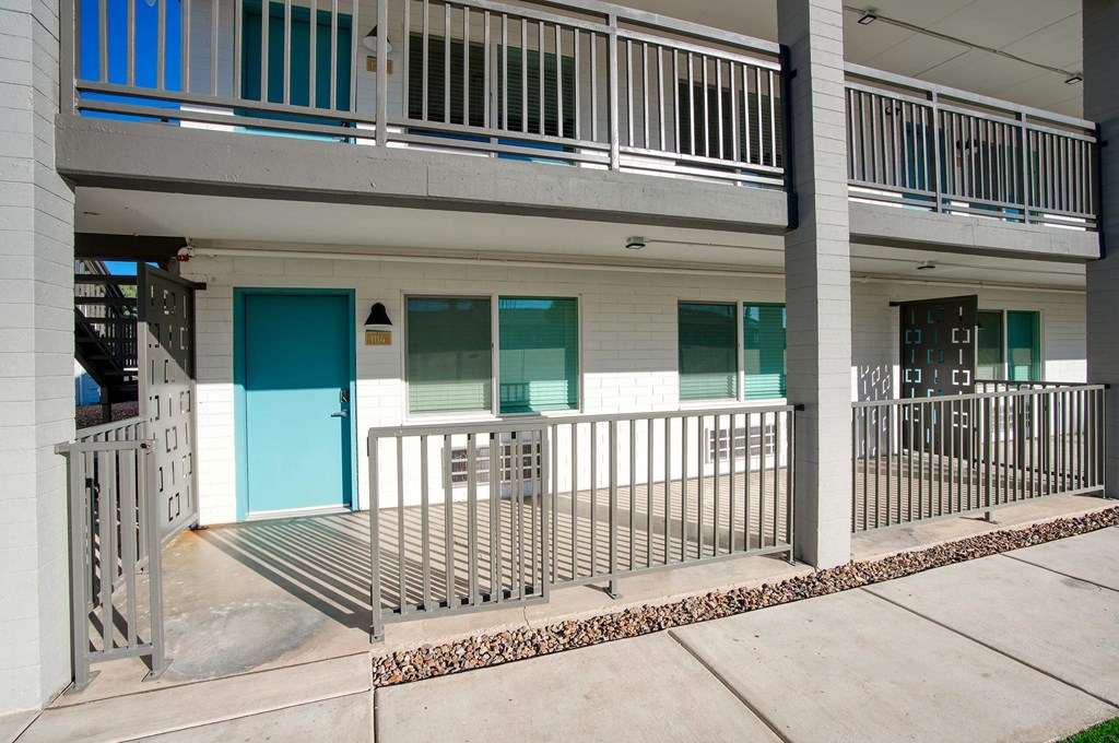 the front of a building with a porch  at Presidio Palms Apartments, Tucson, AZ, Arizona