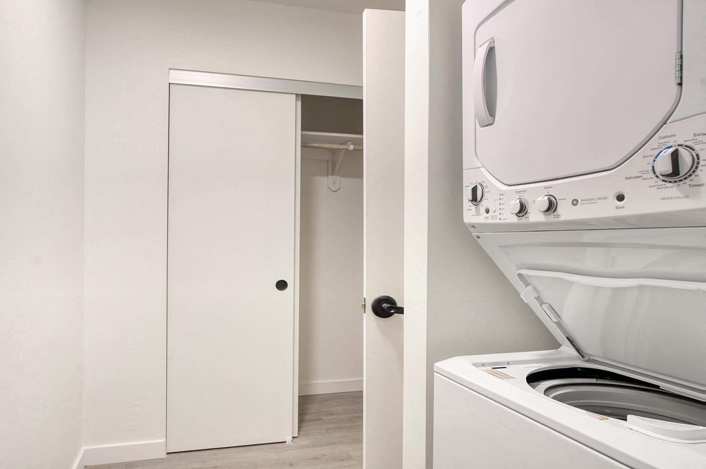 a washer and dryer in a laundry room at Presidio Palms Apartments, Tucson, AZ, 85701