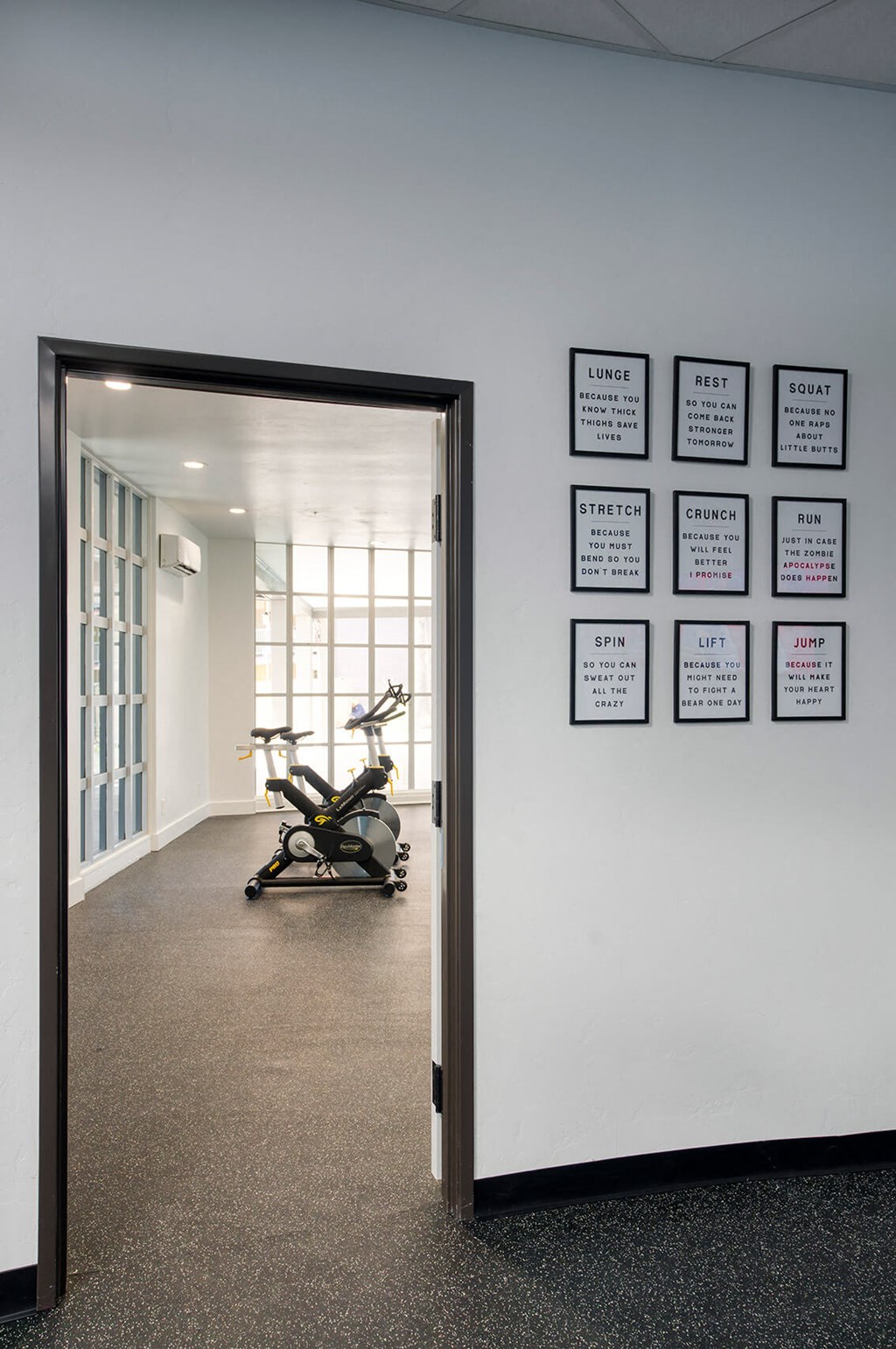 a view of a office with chairs and a door at Presidio Palms Apartments, Tucson