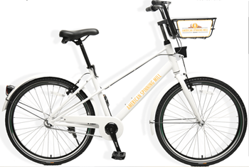 a bike with a white frame and black tires on a white at American Spinning Mill, Greenville