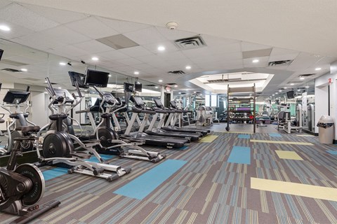 fitness center with cardio equipment