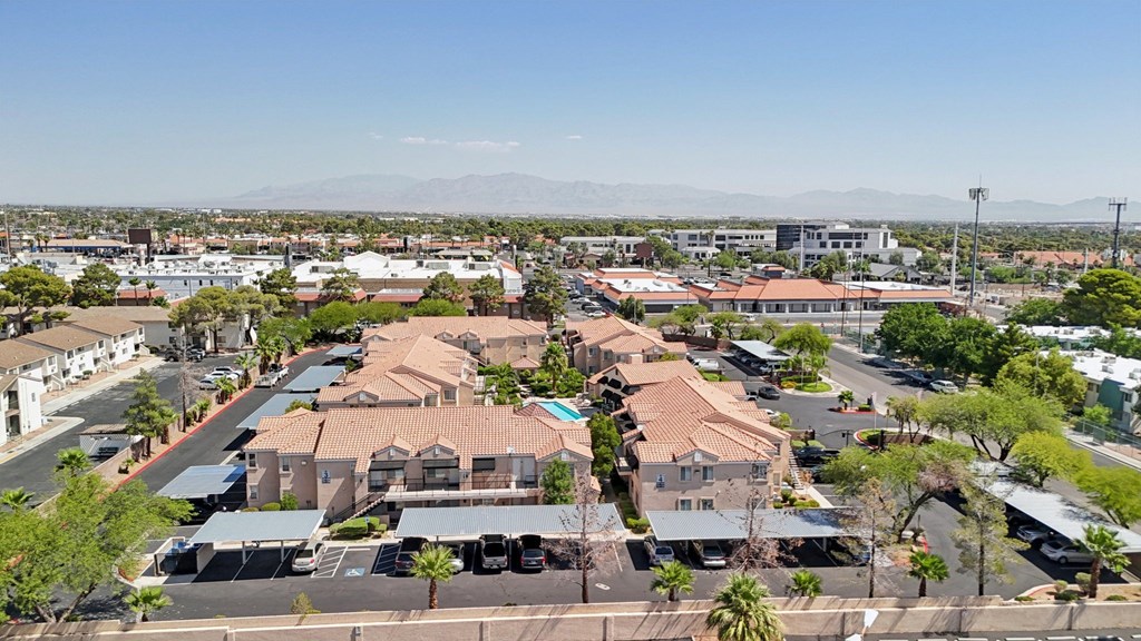 A view of Versailles from above showing covered parking