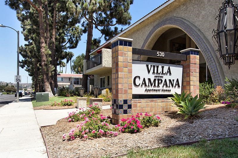 a sign for the villa campagna apartment building