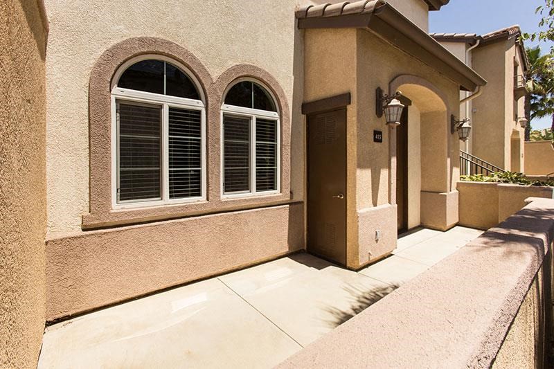 a house with a driveway and a door
