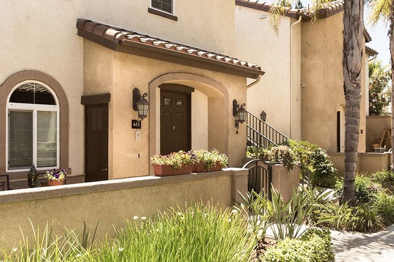 a house with a front porch and a door