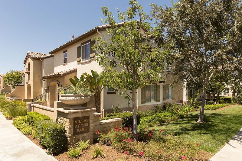 a house with a sign in front of it