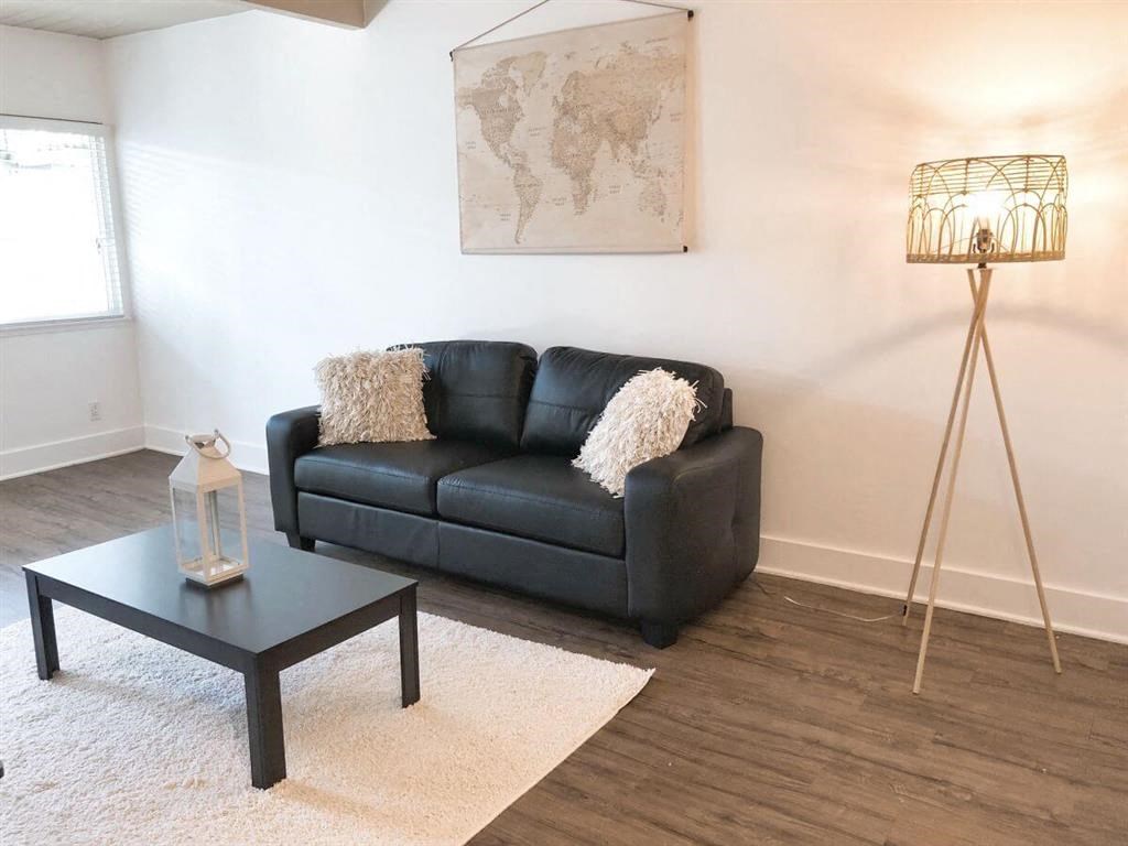 a living room with a couch and a coffee table