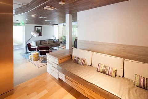 a living room with a couch and a table