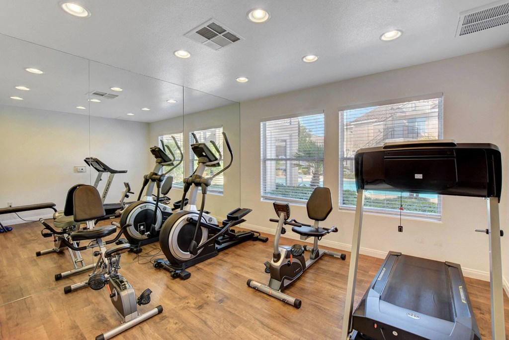 the fitness center at Versailles Senior Apartments