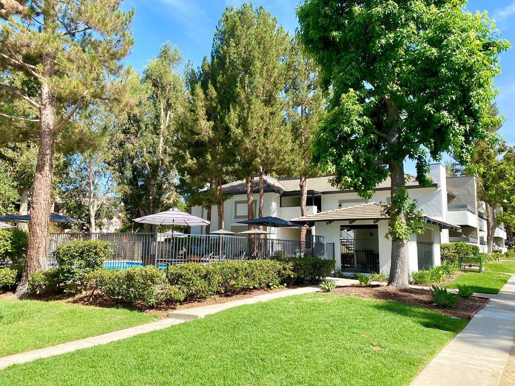 building exterior featuring exterior of pool