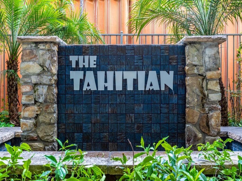 Front stone sign at The Tahitian apartments