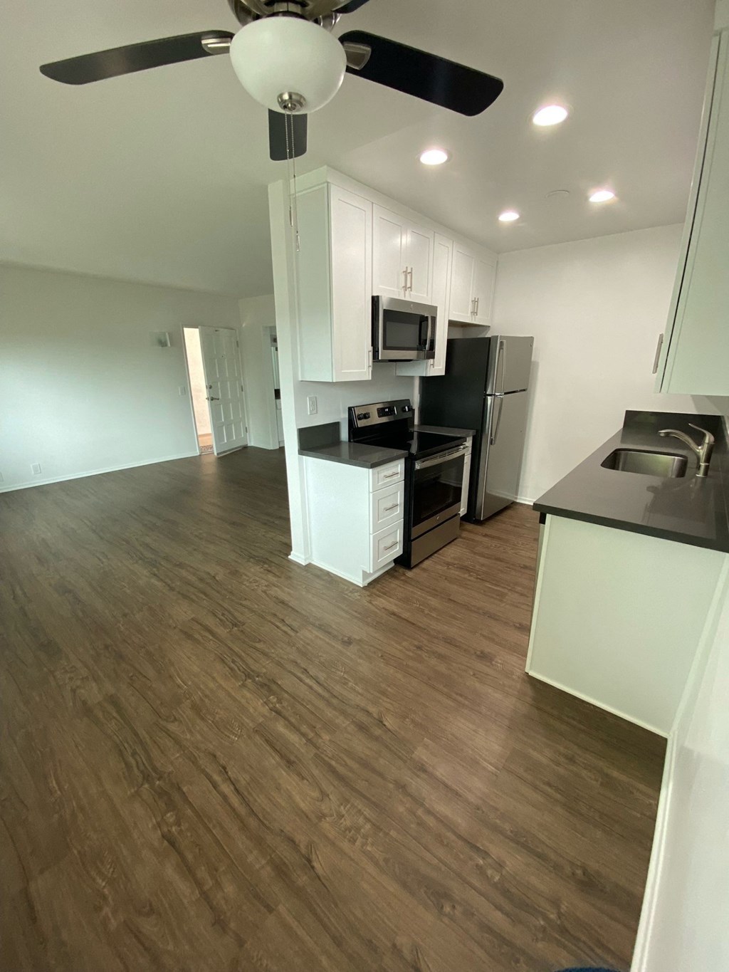 an open concept kitchen and living room