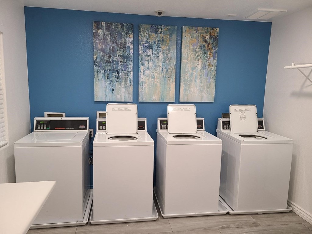 Laundry room at Versailles senior apartments