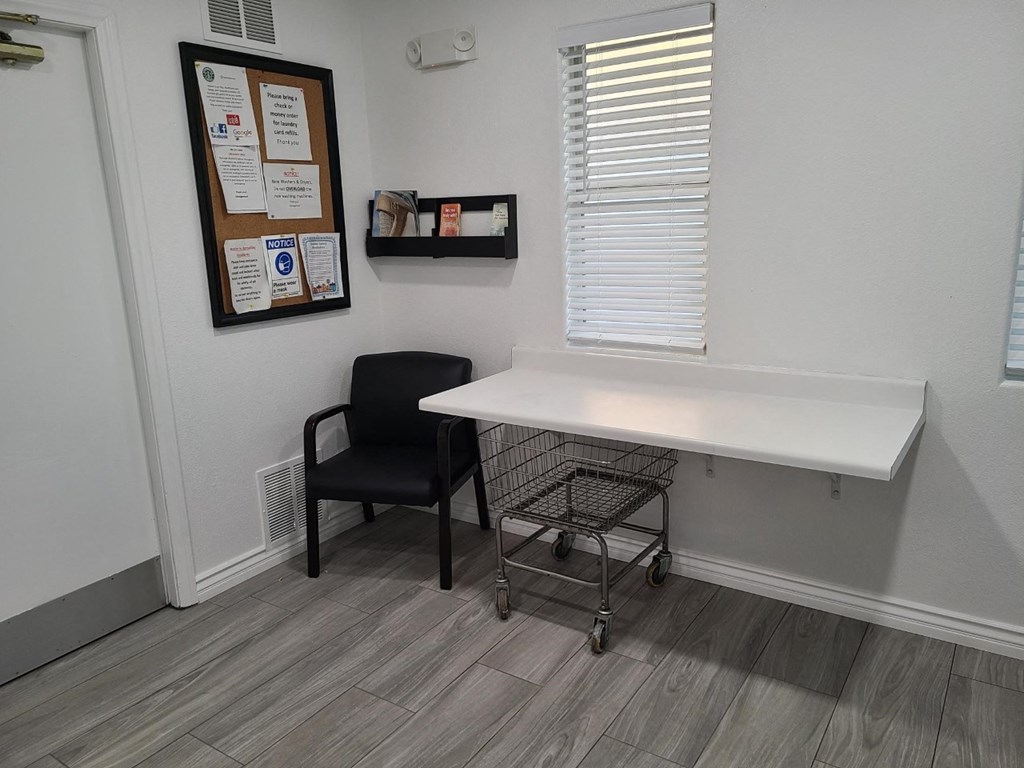 Folding area in the laundry room at Versailles