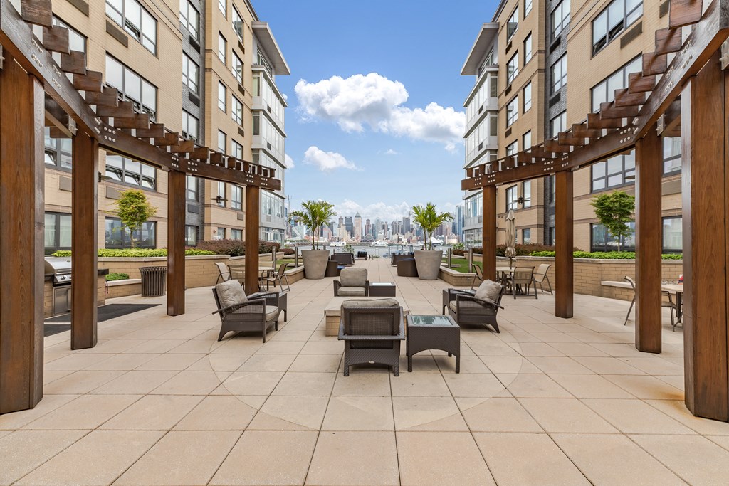 a rendering of a patio with chairs and tables