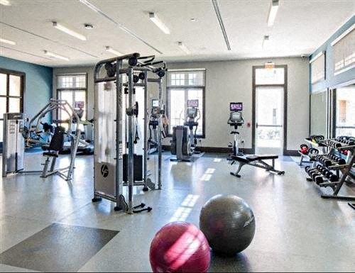 a gym with weights and other exercise equipment