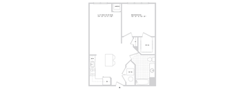A floor plan of a small apartment with a living room, bedroom, and a kitchen.