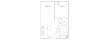 A floor plan of a living/dining area and a bedroom with a kitchenette.